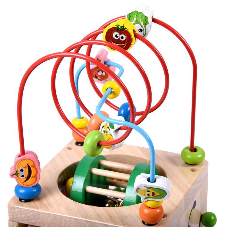 Wooden children's puzzle beetle surrounded by large beads - Here2Save