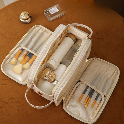 Bolsa de cosméticos con diseño en forma de U con cremallera doble de tres capas Bolsas de maquillaje de alta capacidad a la moda Bolsa de almacenamiento de cuero Pu portátil para productos para el cuidado de la piel