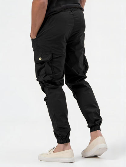 Pantalones cargo para hombre con bolsillos tridimensionales Pantalones casuales de color sólido