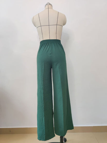 Pantalones casuales de pierna ancha plisados ​​sueltos de color liso