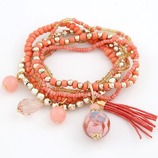 Pulsera elástica multicapa con cuentas de arroz y borlas de vidrio