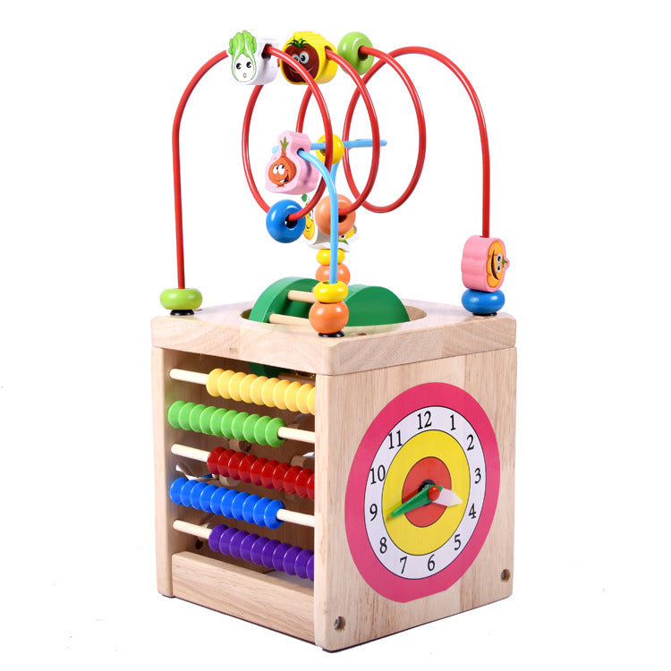 Wooden children's puzzle beetle surrounded by large beads