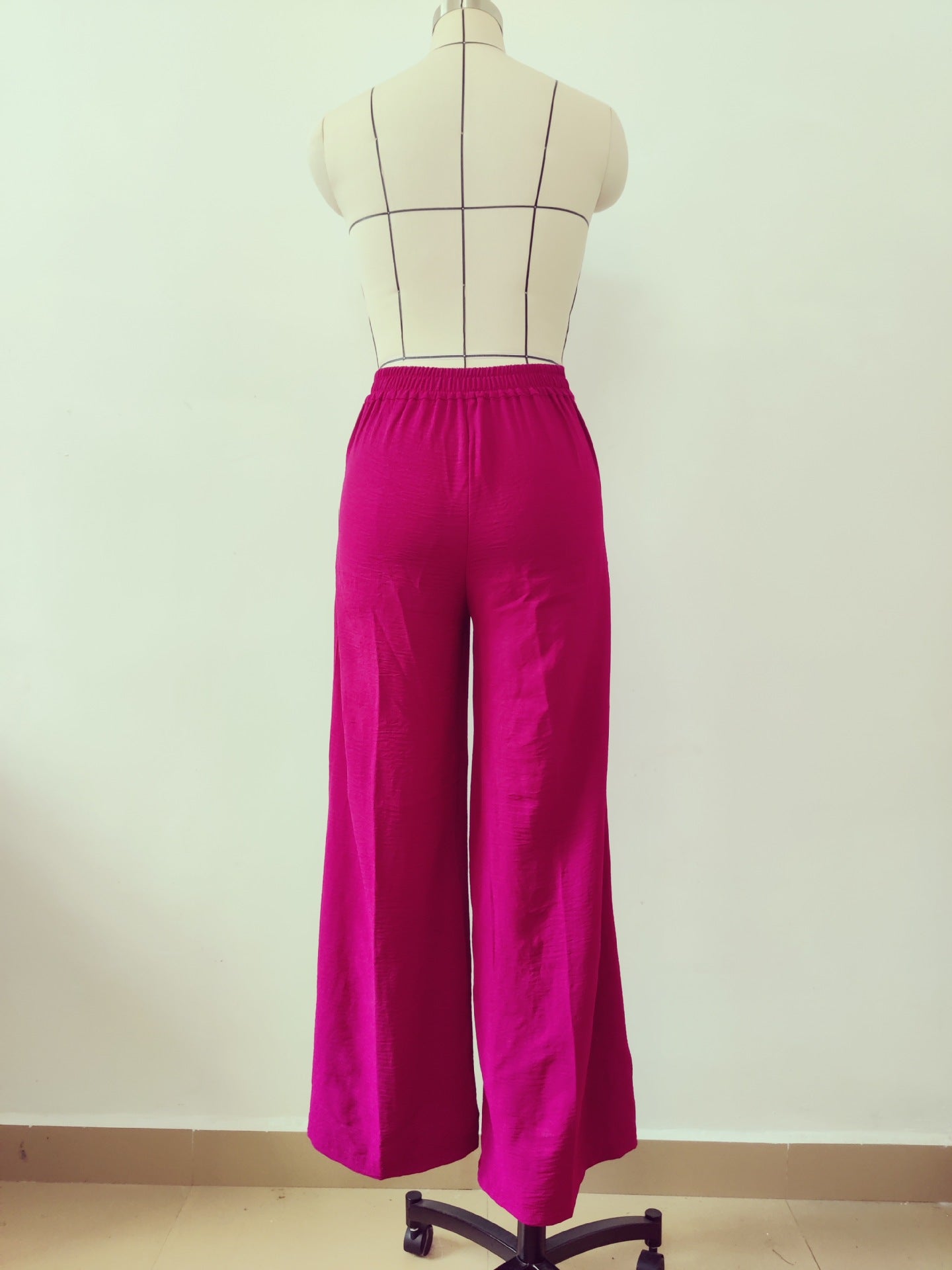 Pantalones casuales de pierna ancha plisados ​​sueltos de color liso