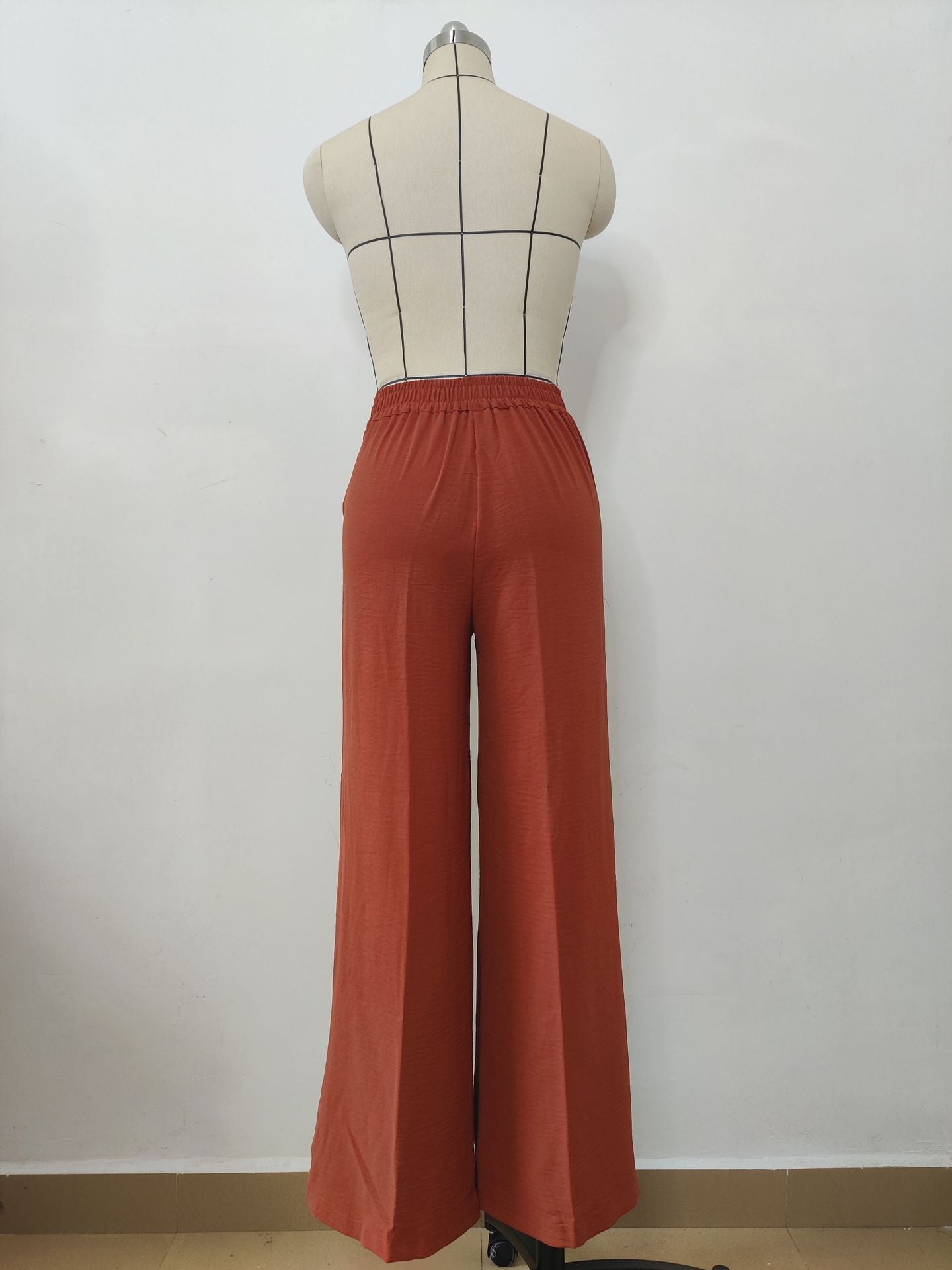 Pantalones casuales de pierna ancha plisados ​​sueltos de color liso